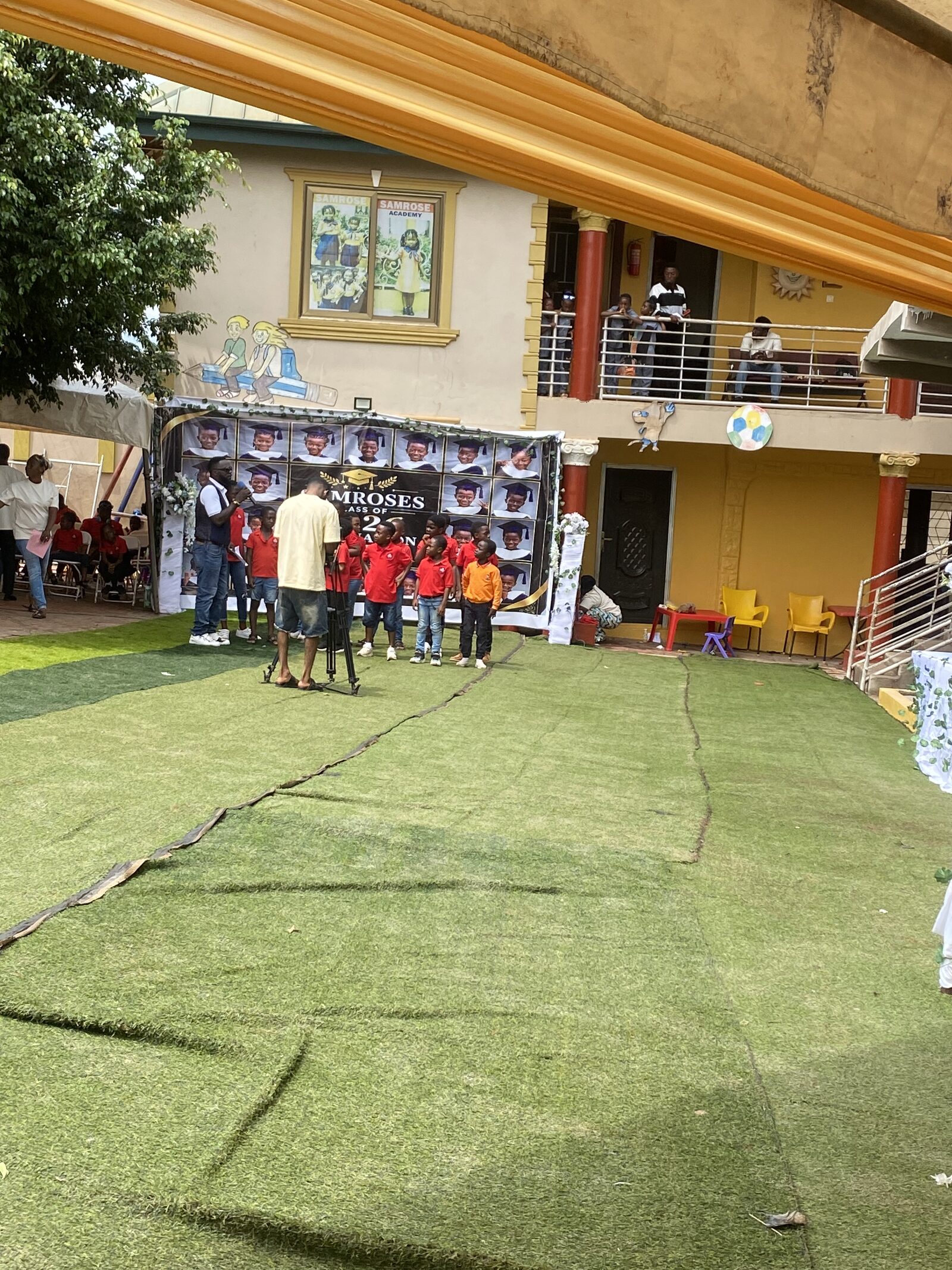 Early Grade Campus courtyard during a Samrose's Academy graduation ceremony
