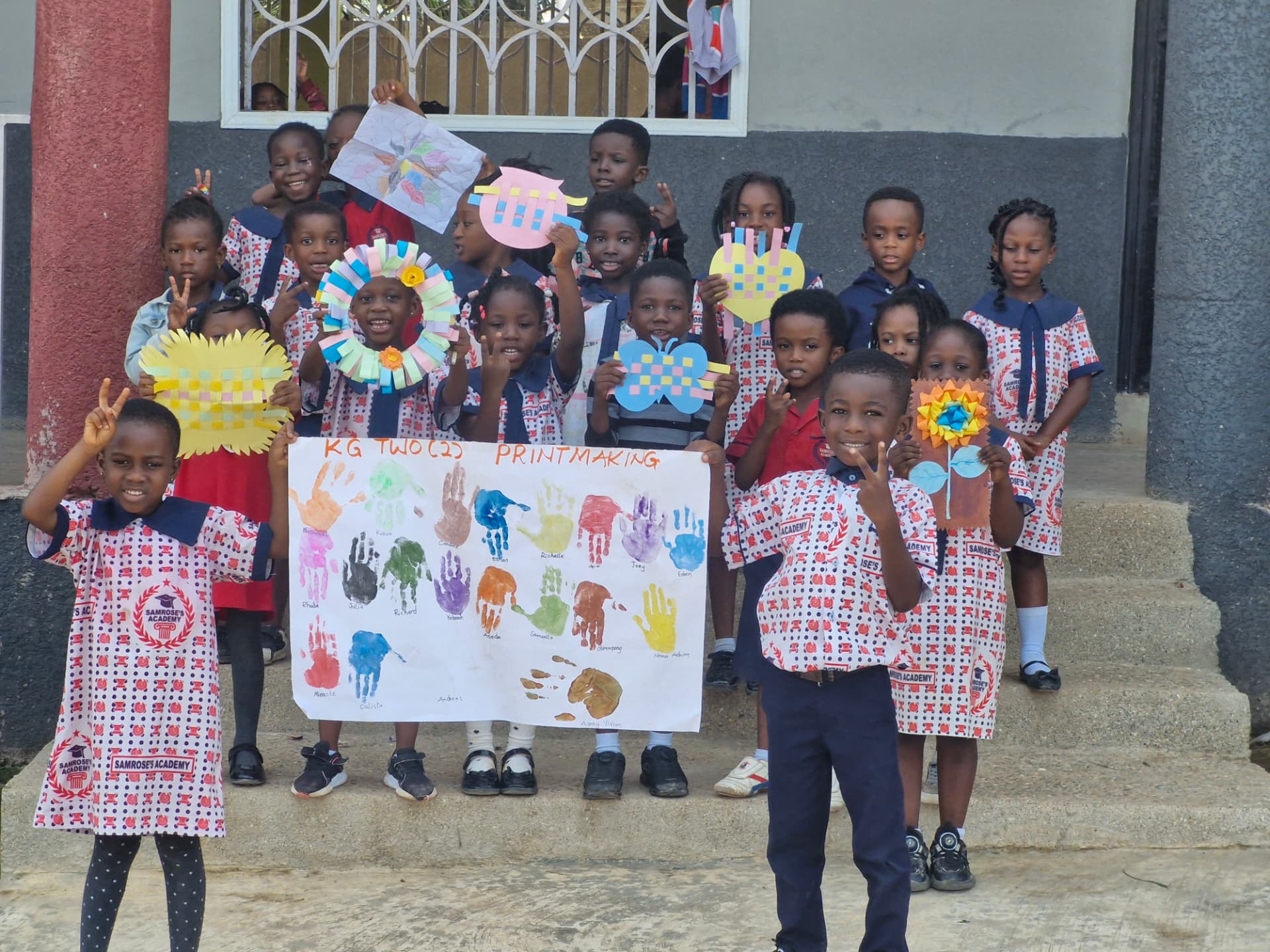 KG Two class displaying their printmaking handprint project